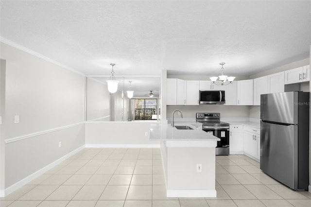 5618 Baywater Dr Unit 5618, Tampa, FL 33615 - kitchen featuring a sink, a peninsula, light countertops, white cabinets, and appliances with stainless steel finishes