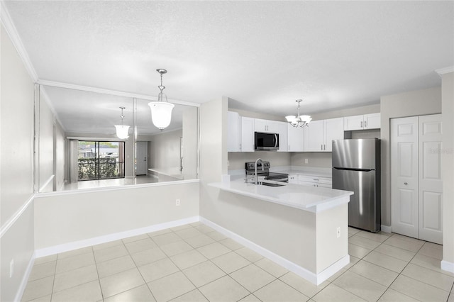 5618 Baywater Dr Unit 5618, Tampa, FL 33615 - kitchen featuring a notable chandelier, white cabinets, light countertops, appliances with stainless steel finishes, and light tile patterned flooring