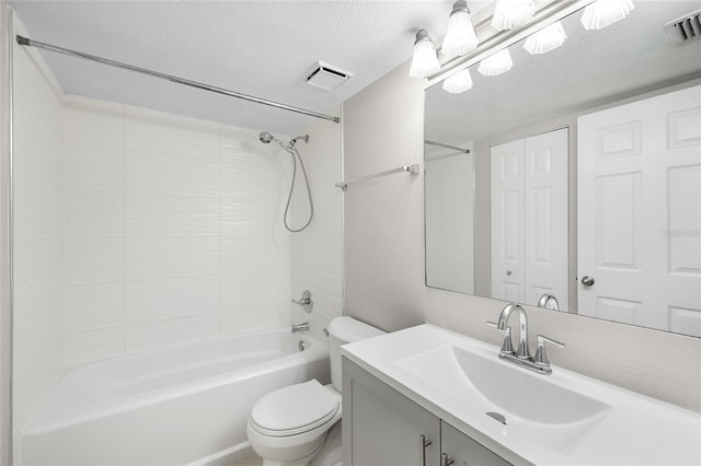 5618 Baywater Dr Unit 5618, Tampa, FL 33615 - bathroom featuring toilet, shower / bathtub combination, visible vents, and a textured ceiling