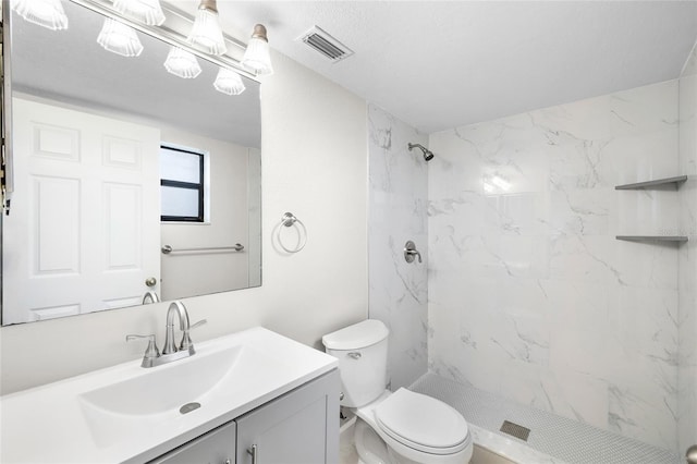 5618 Baywater Dr Unit 5618, Tampa, FL 33615 - full bath featuring vanity, toilet, a marble finish shower, and visible vents