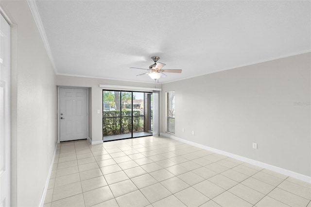 5618 Baywater Dr Unit 5618, Tampa, FL 33615 - spare room featuring baseboards, crown molding, ceiling fan, and light tile patterned flooring