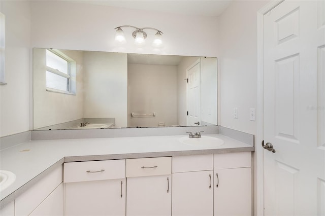 full bathroom featuring vanity and toilet