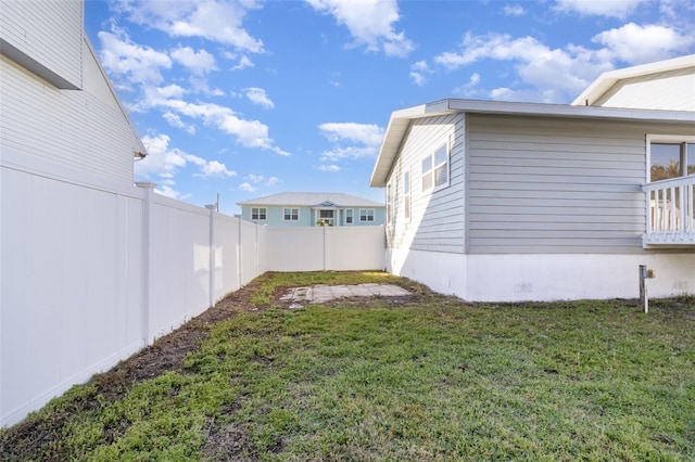 view of yard featuring a fenced backyard