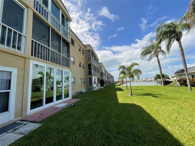 view of yard featuring a water view