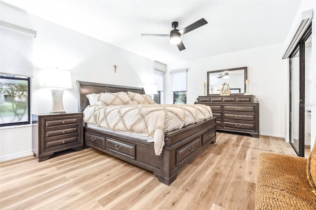 bedroom with ceiling fan and light hardwood / wood-style flooring