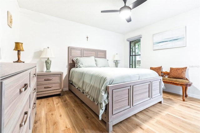 bedroom featuring light hardwood / wood-style floors and ceiling fan