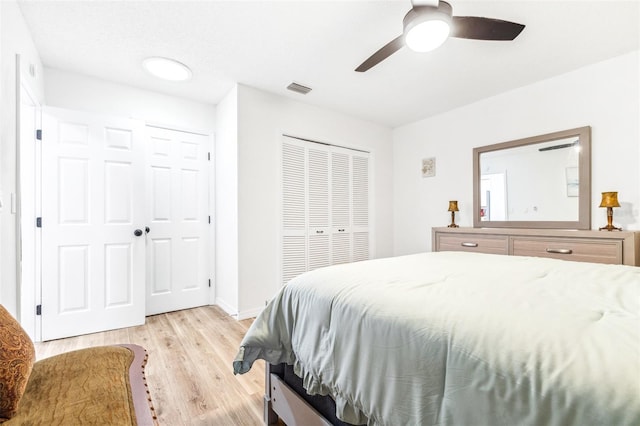 bedroom with ceiling fan and light wood-type flooring