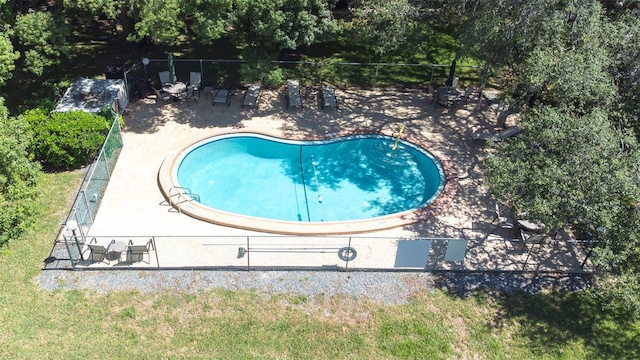 view of swimming pool featuring a patio area