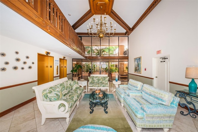 living area with baseboards, a chandelier, elevator, a high ceiling, and light tile patterned flooring