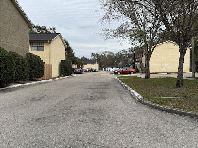 view of street featuring curbs