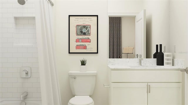 full bathroom featuring toilet, shower / bath combo with shower curtain, and vanity