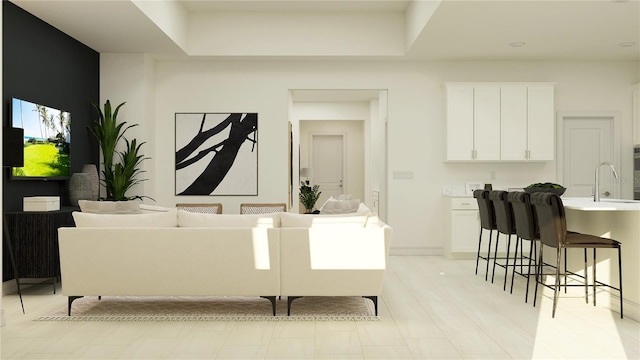 living room featuring sink