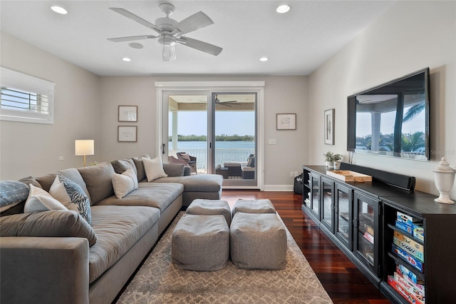 living room with recessed lighting, dark wood-style flooring, a healthy amount of sunlight, and ceiling fan