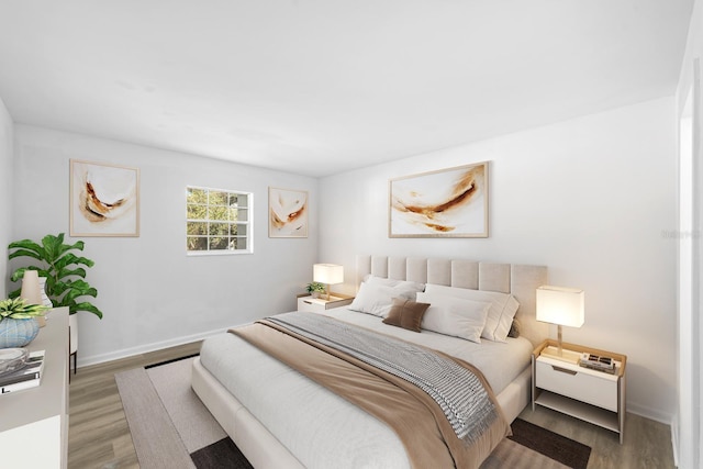 bedroom featuring hardwood / wood-style floors