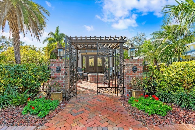 view of gate featuring french doors