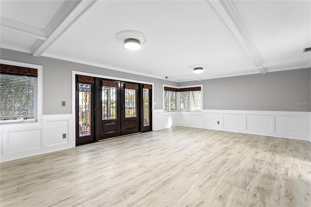 entryway featuring light wood-type flooring, french doors, beamed ceiling, and crown molding