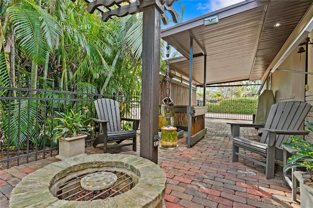 view of patio / terrace with a fire pit