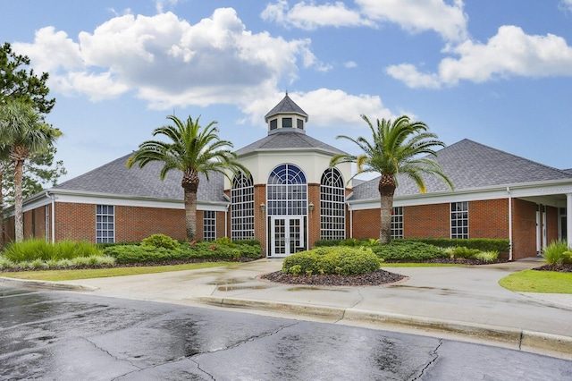 view of property with concrete driveway