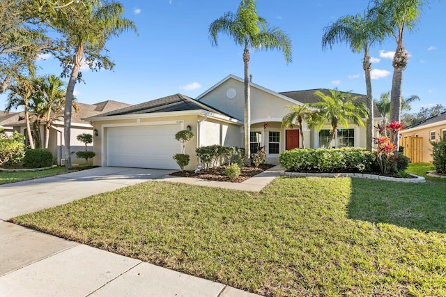 single story home featuring an attached garage, fence, driveway, stucco siding, and a front lawn