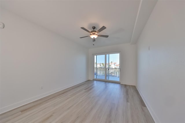 spare room featuring ceiling fan and light hardwood / wood-style floors