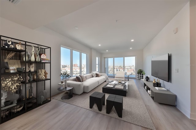 living room with light hardwood / wood-style floors