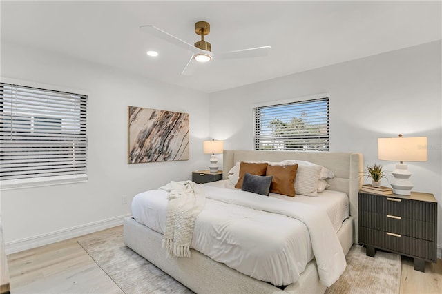 bedroom featuring ceiling fan and wood-type flooring