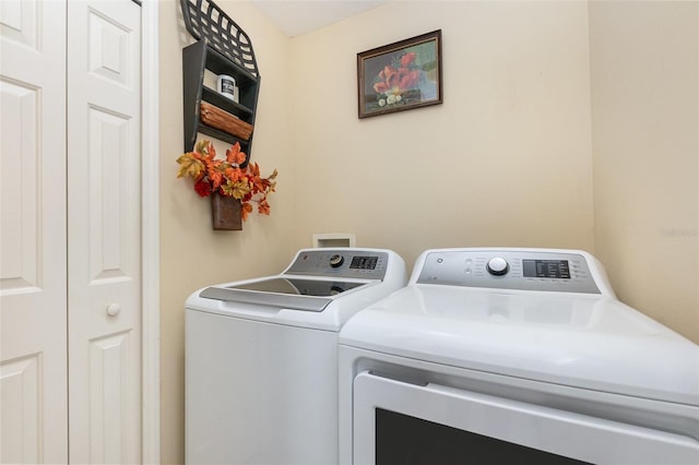 laundry room featuring laundry area and washer and dryer