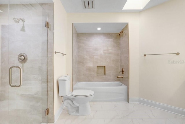 bathroom with independent shower and bath, toilet, and a skylight