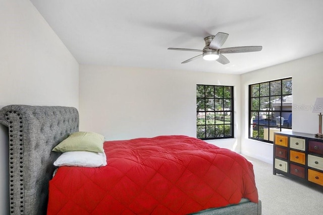 bedroom with carpet flooring and ceiling fan