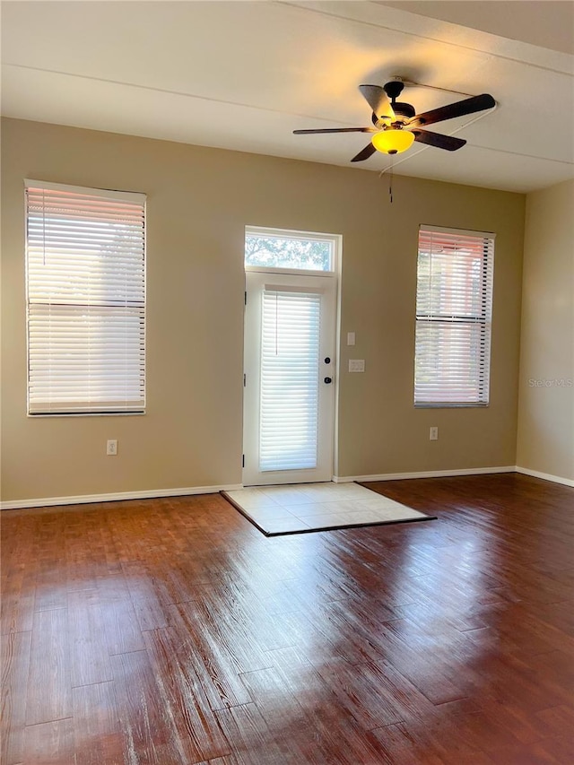 entryway with hardwood / wood-style flooring and ceiling fan