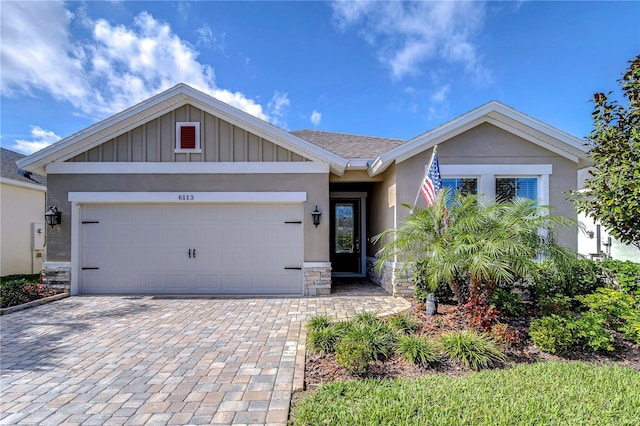 view of front of property with a garage