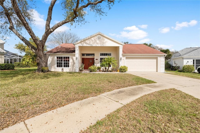 view of front of home with a garage and a front lawn