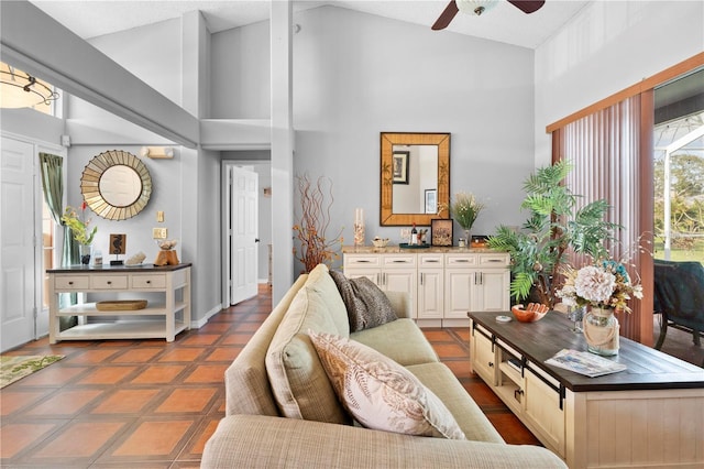 13542 Summerwood Ct, Hudson, FL 34667 - living room featuring high vaulted ceiling and ceiling fan