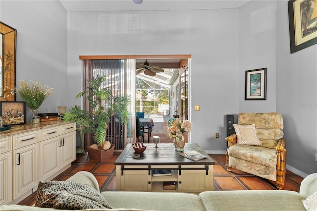 13542 Summerwood Ct, Hudson, FL 34667 - living area featuring ceiling fan and tile patterned flooring