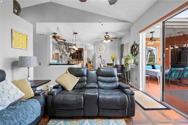 13542 Summerwood Ct, Hudson, FL 34667 - living room featuring ceiling fan and vaulted ceiling