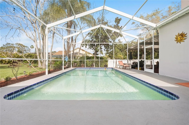 13542 Summerwood Ct, Hudson, FL 34667 - view of swimming pool featuring a lanai and a patio area