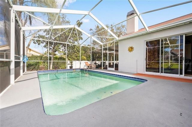 13542 Summerwood Ct, Hudson, FL 34667 - view of pool with glass enclosure and a patio area