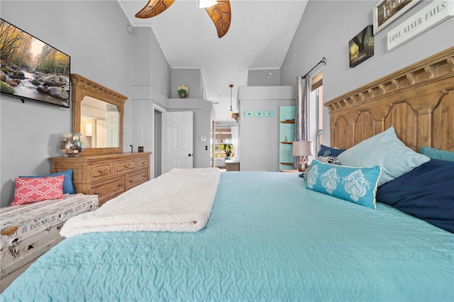 13542 Summerwood Ct, Hudson, FL 34667 - bedroom with multiple windows, vaulted ceiling, and ceiling fan
