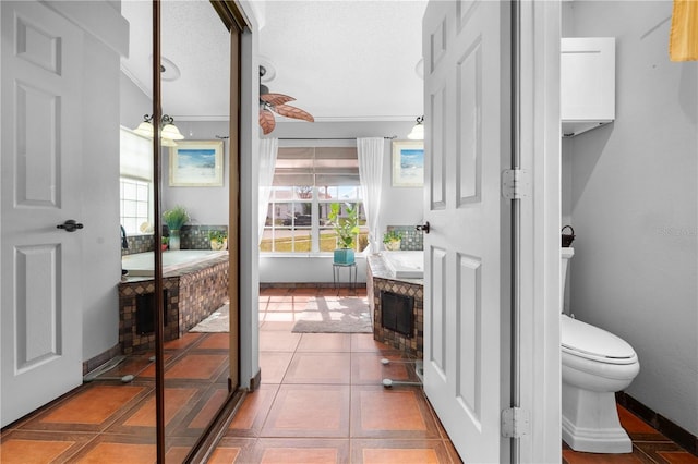13542 Summerwood Ct, Hudson, FL 34667 - bathroom with tile patterned floors and toilet
