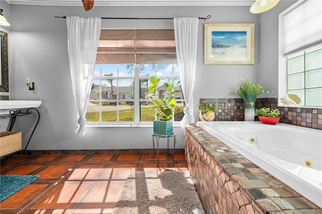 13542 Summerwood Ct, Hudson, FL 34667 - bathroom with tiled bath and tile patterned flooring