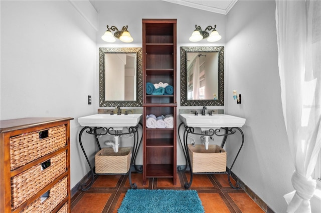 13542 Summerwood Ct, Hudson, FL 34667 - bathroom with ornamental molding, sink, and tile patterned flooring