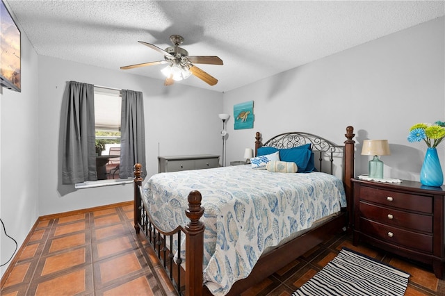 13542 Summerwood Ct, Hudson, FL 34667 - bedroom with a textured ceiling and ceiling fan
