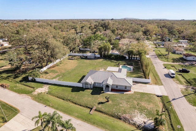 aerial view with a wooded view