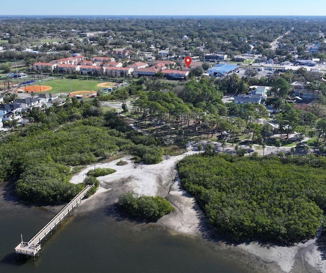 birds eye view of property with a residential view and a water view