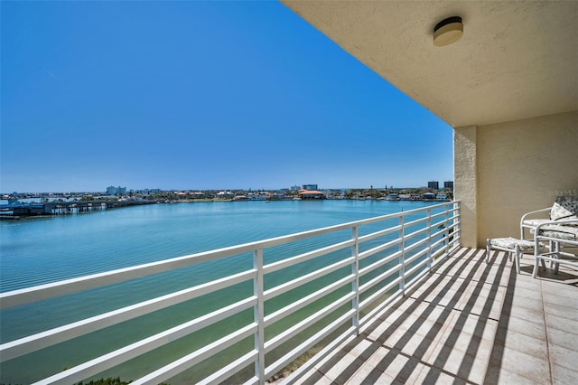 balcony featuring a water view