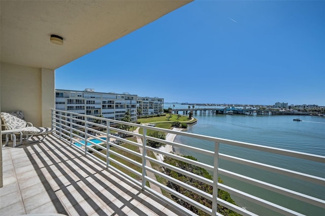 balcony featuring a water view