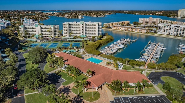 birds eye view of property featuring a water view