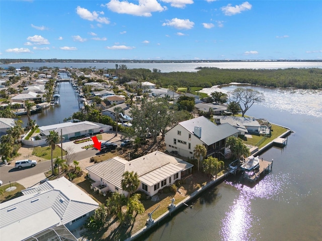 aerial view with a water view and a residential view