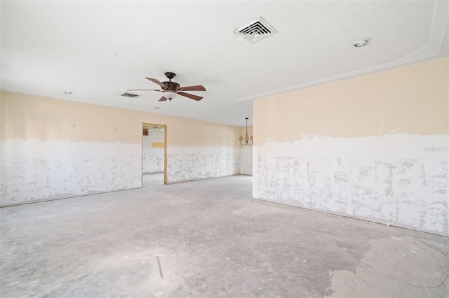 spare room with unfinished concrete floors, visible vents, and a ceiling fan