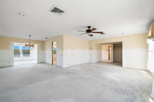 empty room with an inviting chandelier, visible vents, and unfinished concrete floors